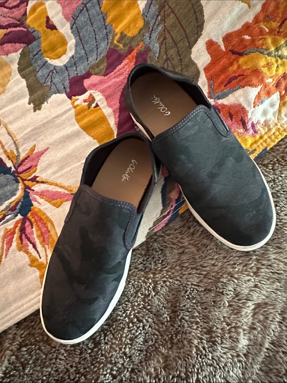 Olukai Black Camouflage Slip-Ons